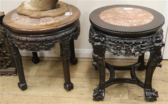 Two Chinese hardwood vase stands, with marble inset tops, largest 1ft 5in.